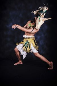 Low angle view of woman dancing