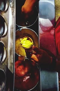 Midsection of man preparing food