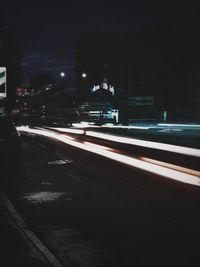 Light trails on city street at night