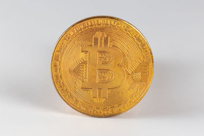 Close-up of coin against white background