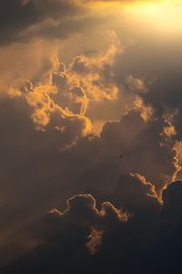 Low angle view of clouds in sky during sunset