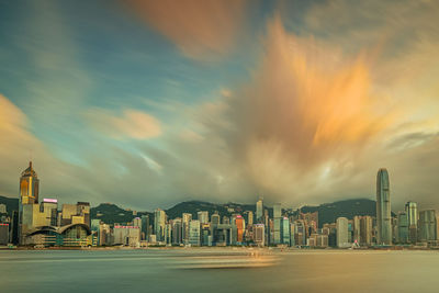 Modern buildings in city against sky