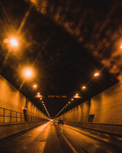 Illuminated street lights at night