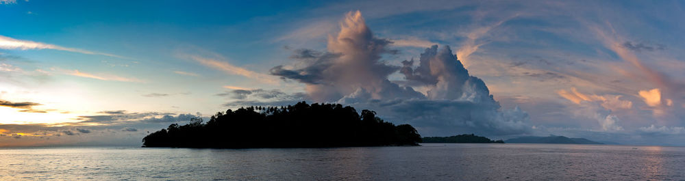 Panoramic view of sea against sky during sunset