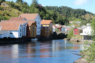 Old houses on shore in sognefjord