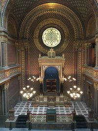 Low angle view of illuminated ceiling in building