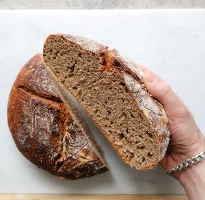 Close-up of hand holding bread