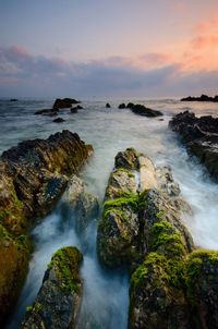 Scenic view of sea against sky during sunset