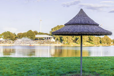 Gazebo by trees against sky