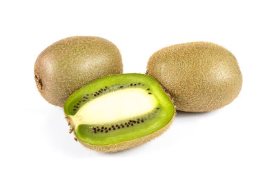 Close-up of fruits against white background