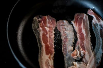 Close-up of meat on barbecue grill