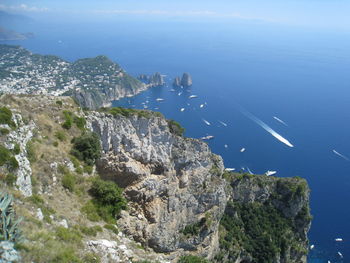 High angle view of rocks by sea