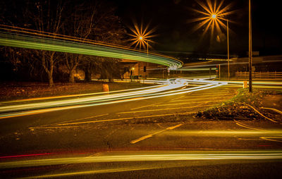 Light trails on city street at night