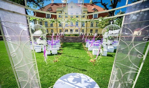 View of lawn with building in background