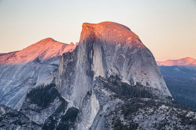 Scenic view of mountain against sky during sunset