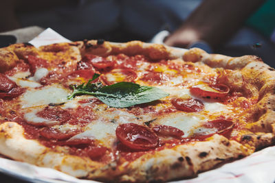 Close-up of pizza on table in restaurant