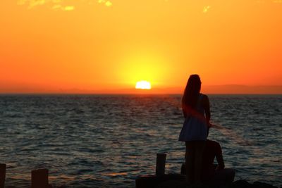 Scenic view of sea at sunset
