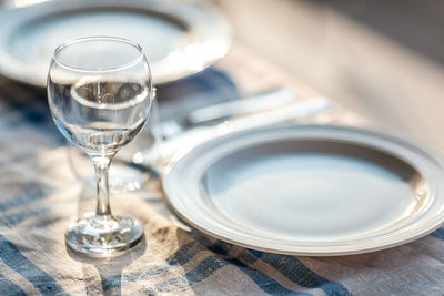 Close-up of wineglass on table