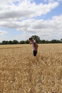 Full length of man standing on field