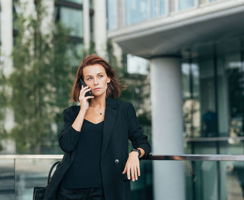 Young woman using mobile phone