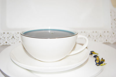 Close-up of tea cup on table