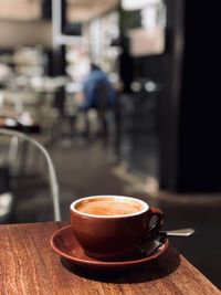 Close-up of coffee on table at cafe