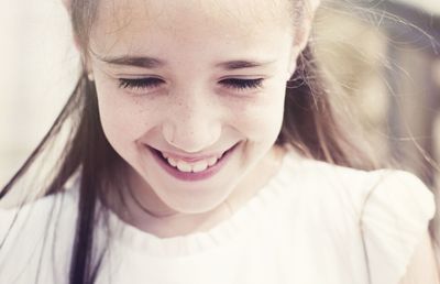 Close-up portrait of a smiling girl