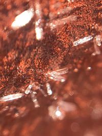 Close-up of illuminated water at night