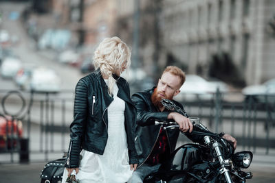 Young couple kissing in city