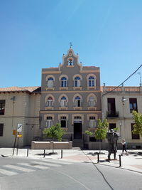 Building against clear blue sky