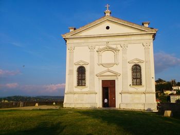 Facade of building against blue sky