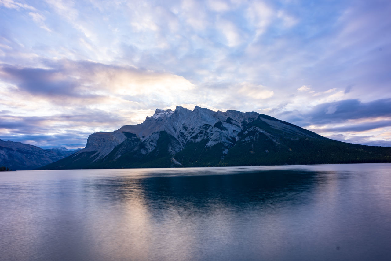 mountain, sky, scenics - nature, beauty in nature, water, cloud - sky, tranquil scene, waterfront, tranquility, lake, mountain range, reflection, nature, idyllic, non-urban scene, no people, environment, landscape, snowcapped mountain, mountain peak