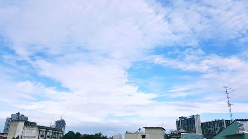 Low angle view of city against sky