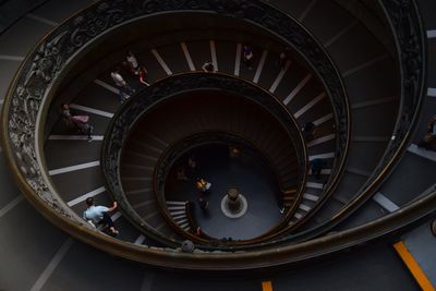 High angle view of people on spiral staircase at vatican museums