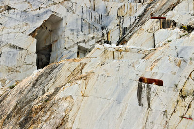 Low angle view of construction site by building