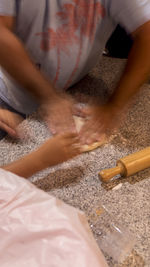 High angle view of hands  people working