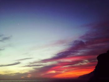 Low angle view of dramatic sky during sunset