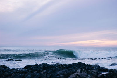 Scenic view of sea against sky during sunset