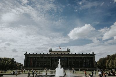 Group of people in front of historical building