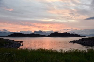 Scenic view of lake against sky during sunset