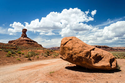 Rock formations in desert against sky