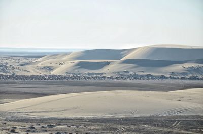 Aerial view of desert against sky