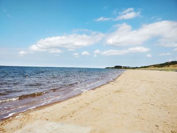 Scenic view of beach against sky