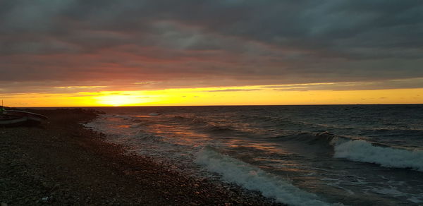 Scenic view of sea against sky during sunset