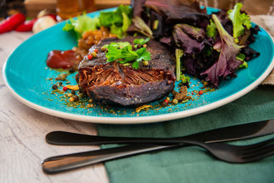 Close-up of food in plate on table