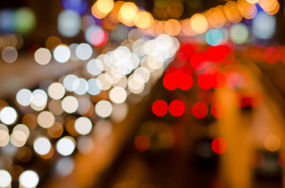 Defocused image of illuminated lights at night