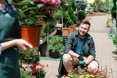 Portrait of senior man gardening at home