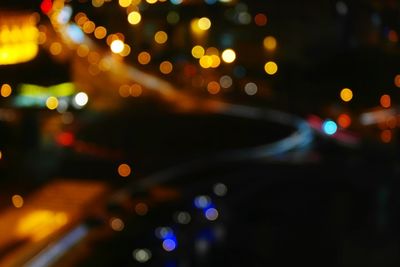 Blurred motion of car on road at night