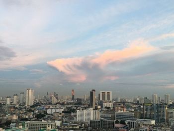 Cityscape against sky during sunset