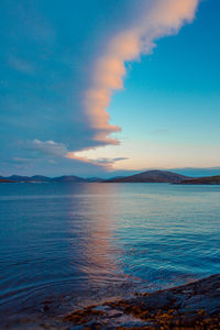 Scenic view of sea against dramatic sky